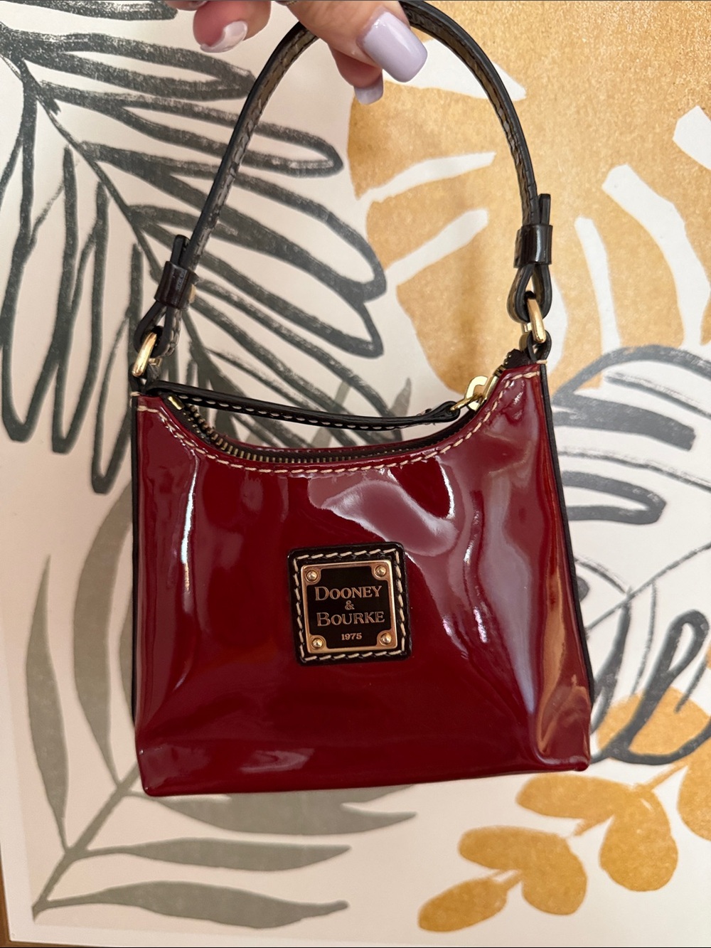 DOONEY & BOURKE Bitsy Glossy Wine Patent Bag with Gold Plaque